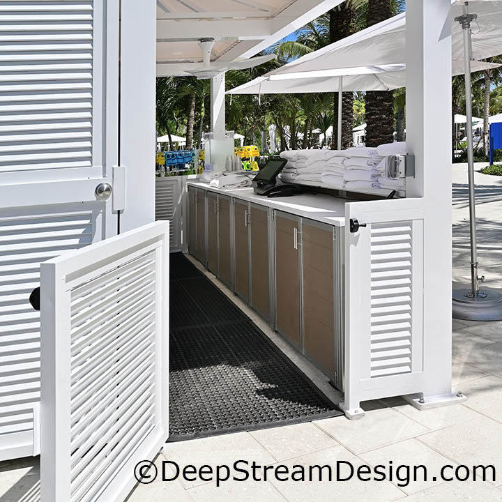 DeepStream's custom fixture, a counter with cabinets to store clean pool towels made with recycled plastic lumber