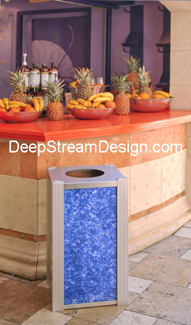 Example of a DeepStream modern Trash Bin or recycling receptacle with 3form Recycled Blue Glass panels at a drink stand